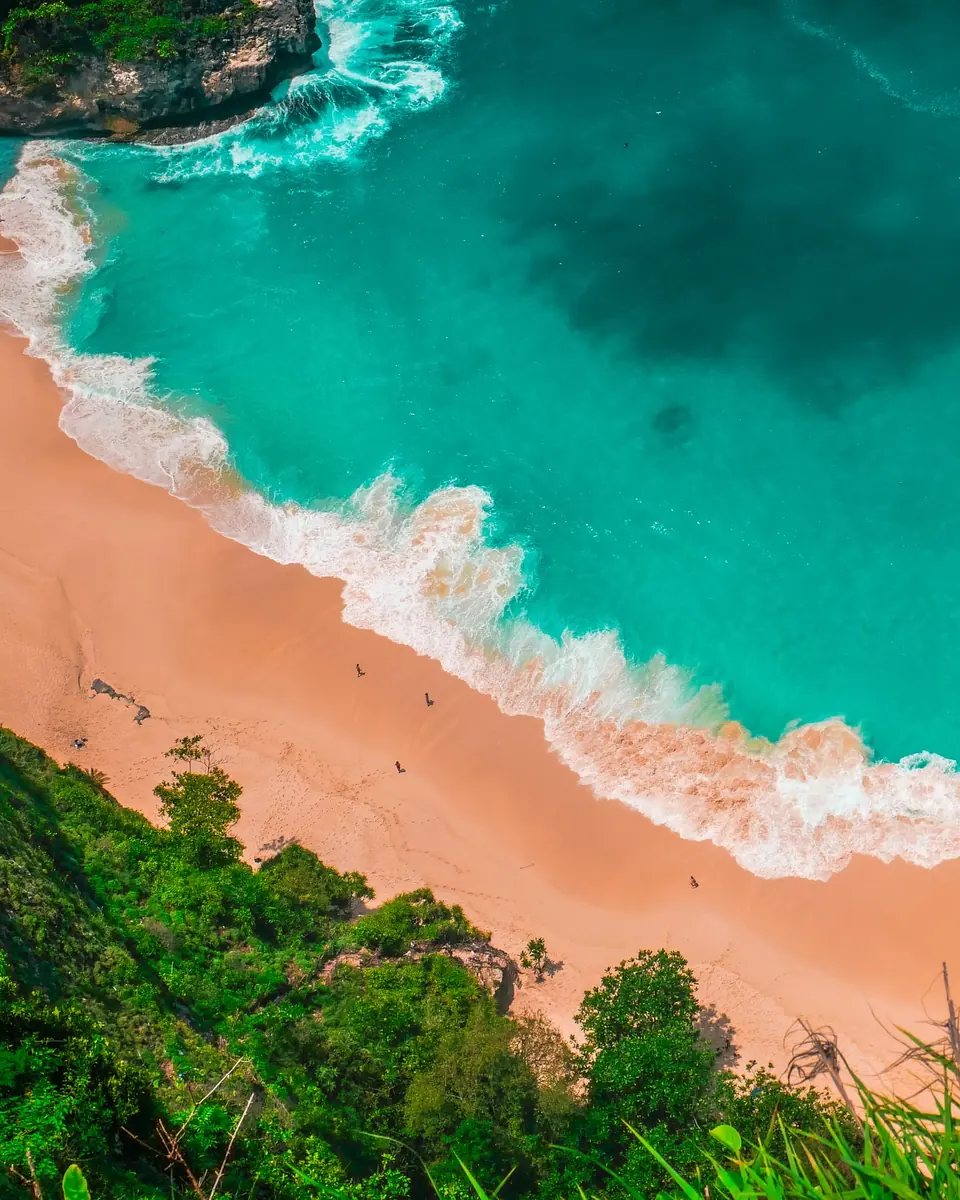 Turquoise sea and a sandy beach from above