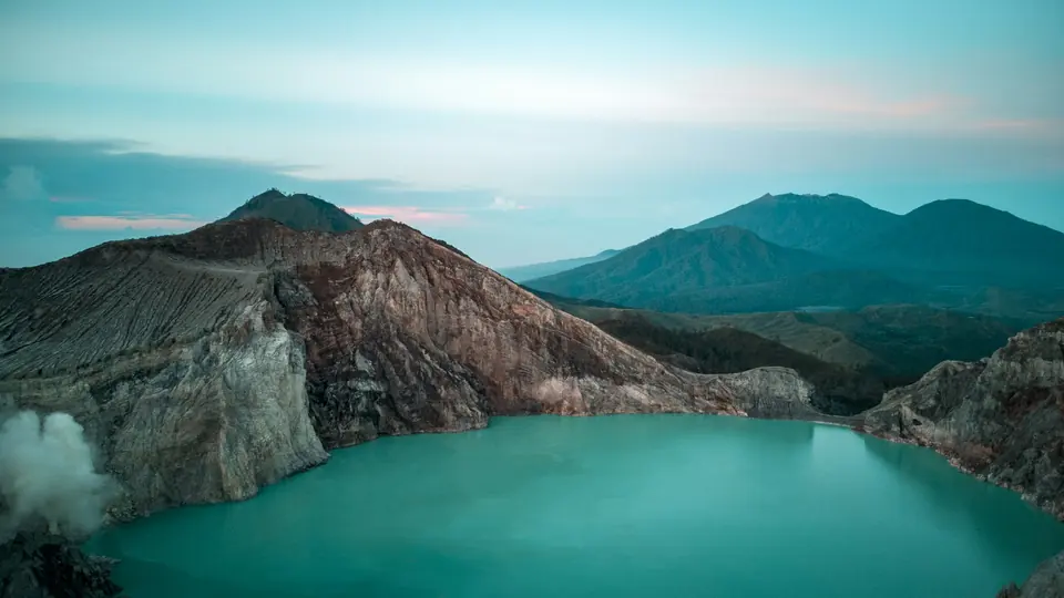 Turquoise acid lake inside the Ijen crater, East Java