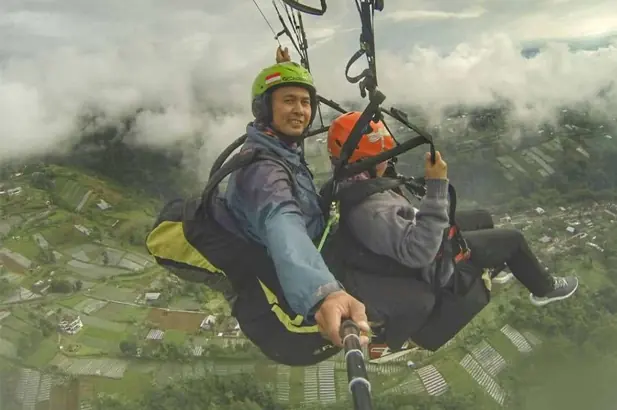 Tandem paragliding over Bali
